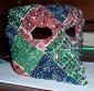 Massimo Spinelli, La maschera della tecnologia (2009), circuiti stampati e microchips