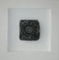 Maurizio Luerti, Secondo preludio A. Disco solare (della serie Frammenti) (2005), legno, cemento e ferro, cm 35x35
