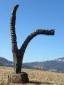 Giampaolo Osele, Deragliato (2008), legno di pero combusto, h cm 180